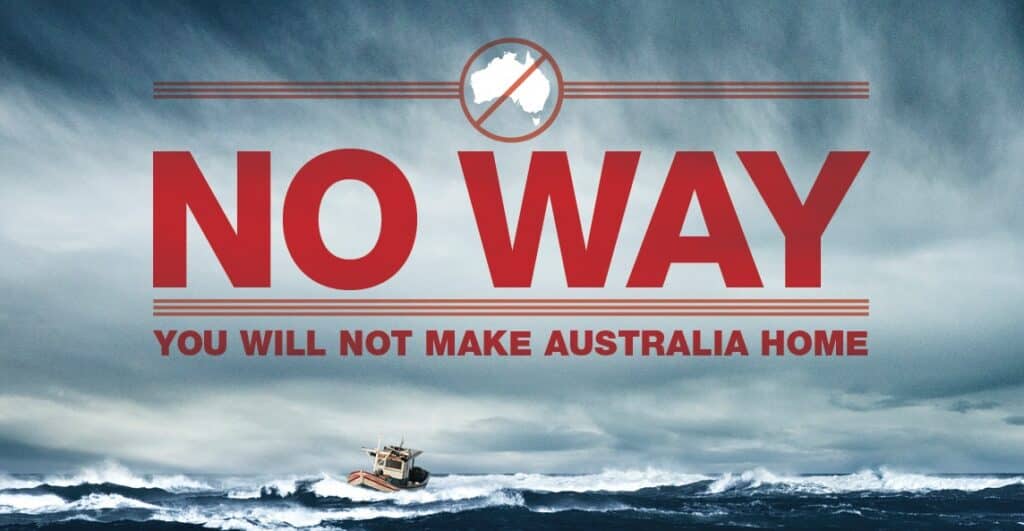 An advertisement with large red letters saying "NO WAY: You will not make Australia Home" against a background of a small fishing boat on rough seas.
