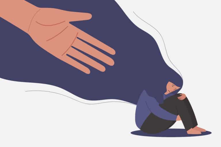 Illustration of a woman sitting on the floor. She is bent over and holding her legs. A giant hand reaches out toward her.